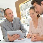 Property contract meeting with real estate agent and potential buyers